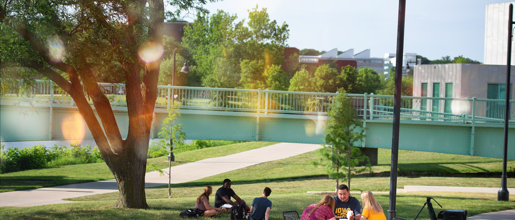 Students studying outdoors at Iowa Memorial Union